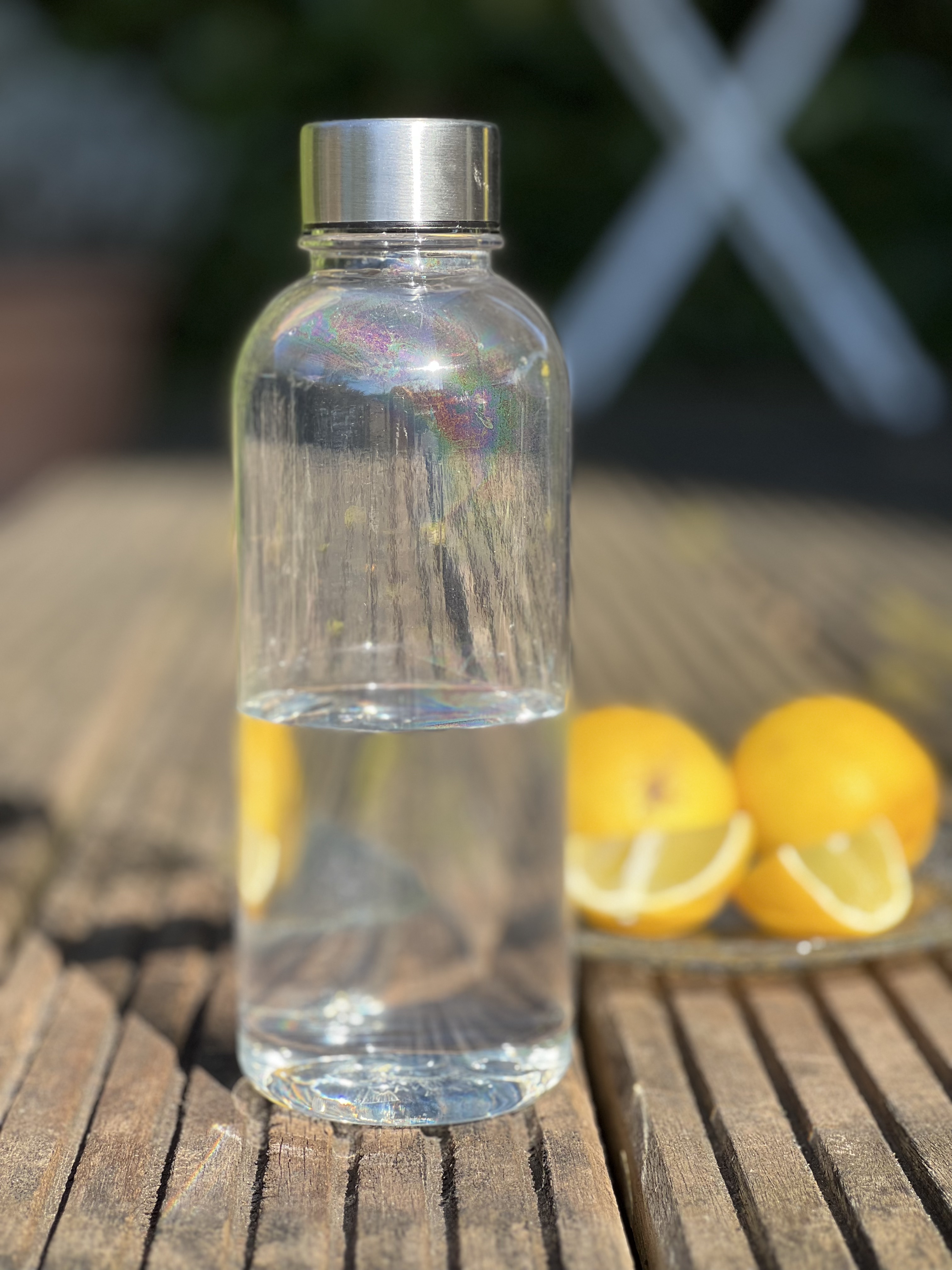 Trinkflasche klar aus recyceltem PET, 600 ML, dargestellt geschlossen.