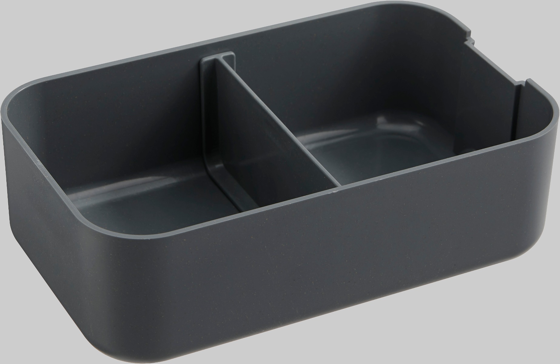 Inneneinteilung der nachhaltigen Lunchbox mit Smartphonehalter und Elastikband.
